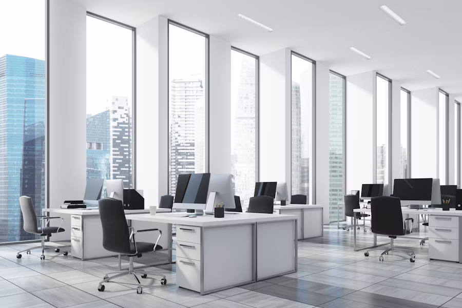 A bright workspace with floor-to-ceiling windows